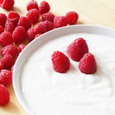 bowl with yougurt and red berries