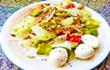 lettuce, avocado, onion, pumpkin seed, bocconcini and olive oil salad