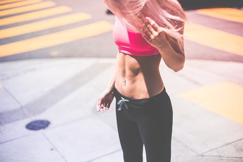 young woman with a flat tummy