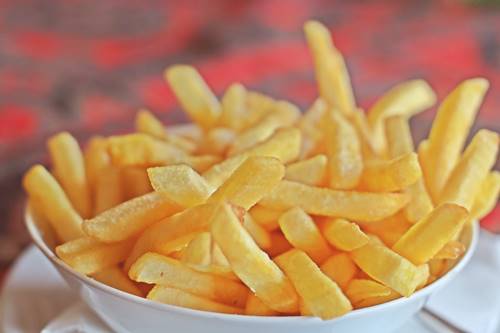a bowl with French fries