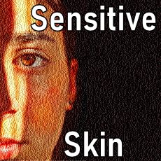 young woman dark background reddened cheek